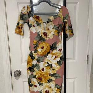 Pink dress with yellow/gold flowers.